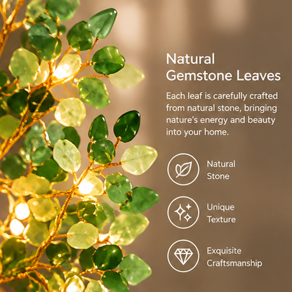 Close-up of green natural stone leaves on gold-toned branches with warm LED lights