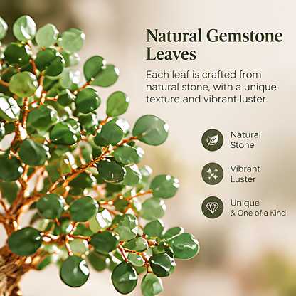 Close-up of lustrous green natural stone leaves attached to gold-toned branches